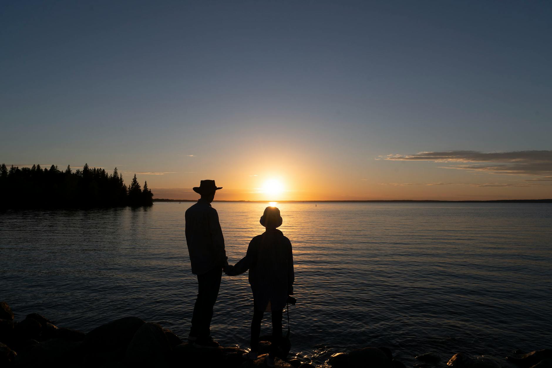 romantic couple on the beach during sunset